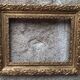 Old gilded frame with leaf