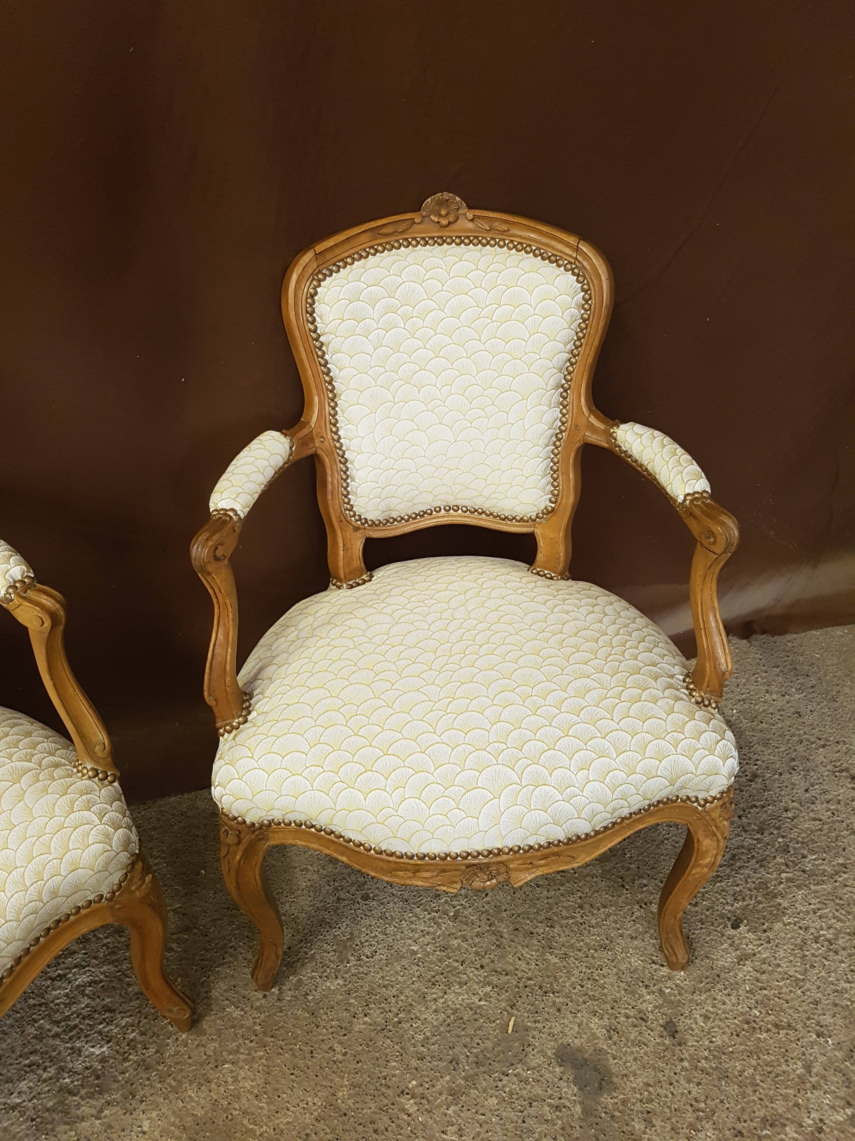 Pair of Louis XV-era convertible armchairs