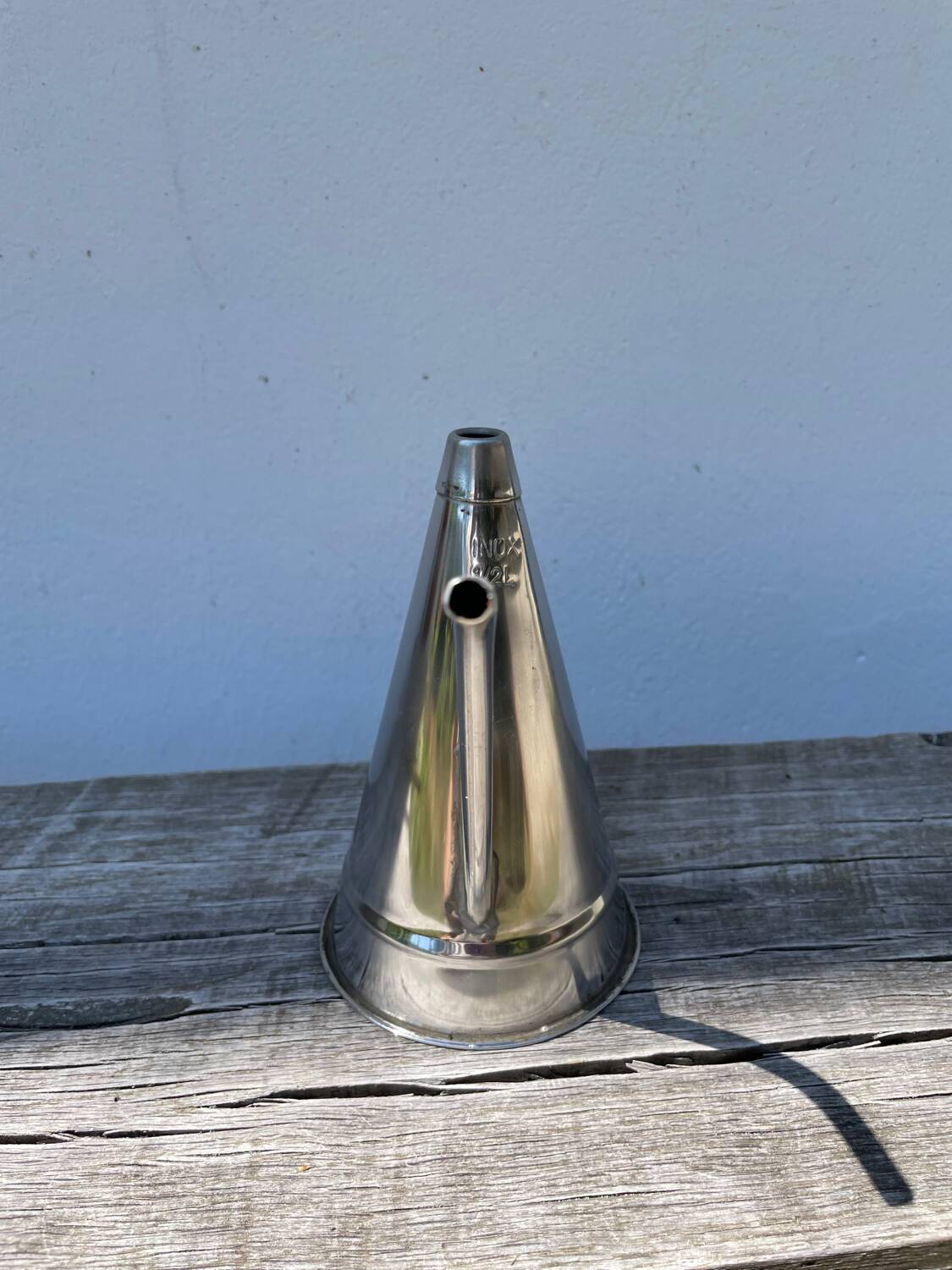 Small stainless steel watering can