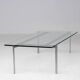 Architectural rectangular coffee table in steel and glass.