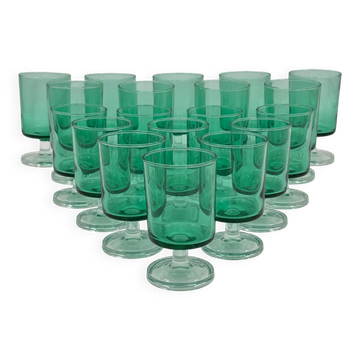 Set of 19 vintage green glass stemmed glasses, two sizes.