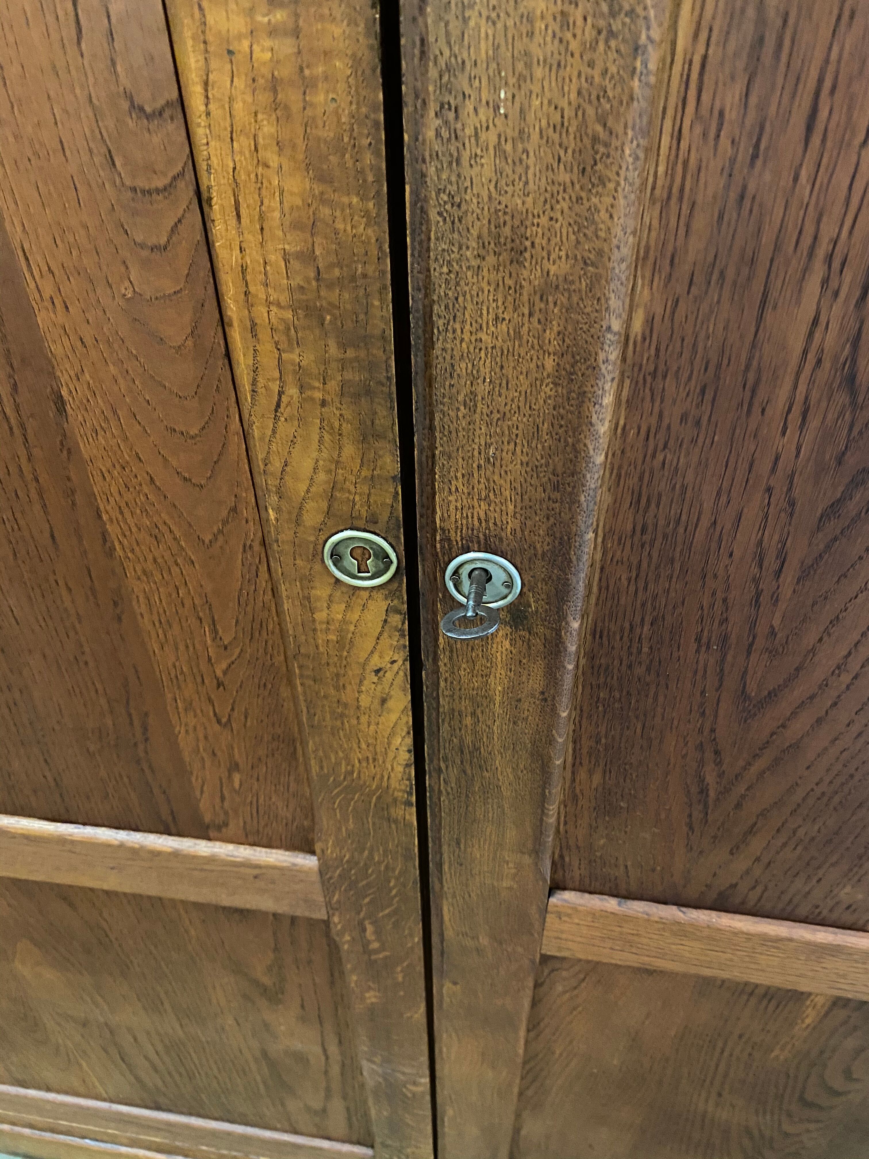 Vintage Parisian solid oak cabinet