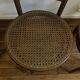 Pair of antique caned bistro chairs stamped Fischel