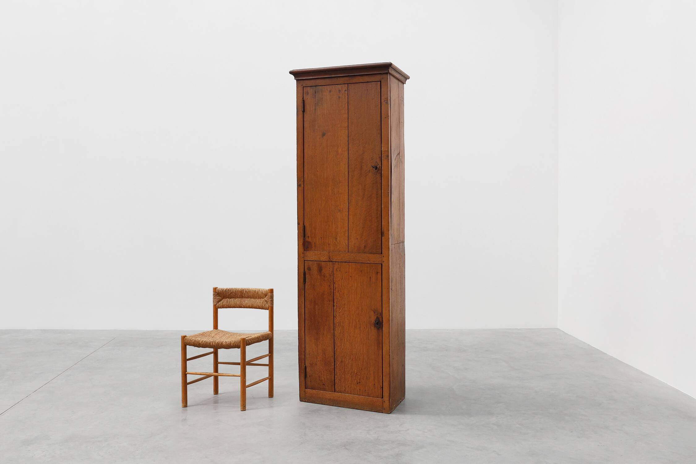 Tall rustic French monastery wardrobe in oak from the late 19th century