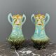 Pair of Art Nouveau vases in glazed ceramic with floral decoration, 20th Century