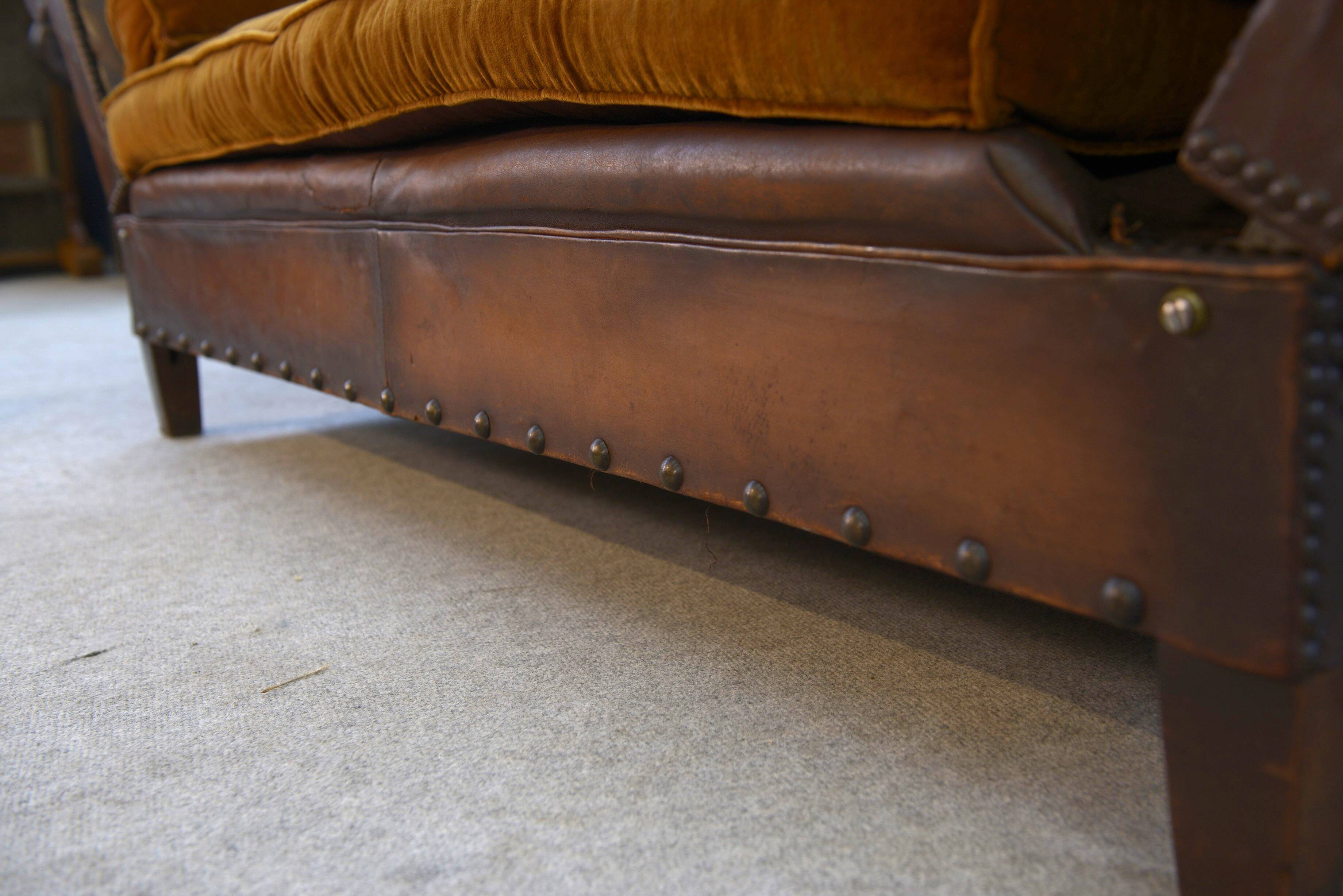 Studded leather bench circa 1920