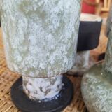 Set of 4 signed enameled vases