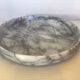 Empty round pocket in gray marble