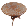 Table basse sculptee en bois exotique