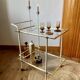 Dessert table with a cream-coloured metal structure and gold brass, 1960s.