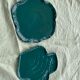 Two dishes empty pocket slurry, biscuits in the shape of vintage green leaf