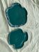 Two dishes empty pocket slurry, biscuits in the shape of vintage green leaf