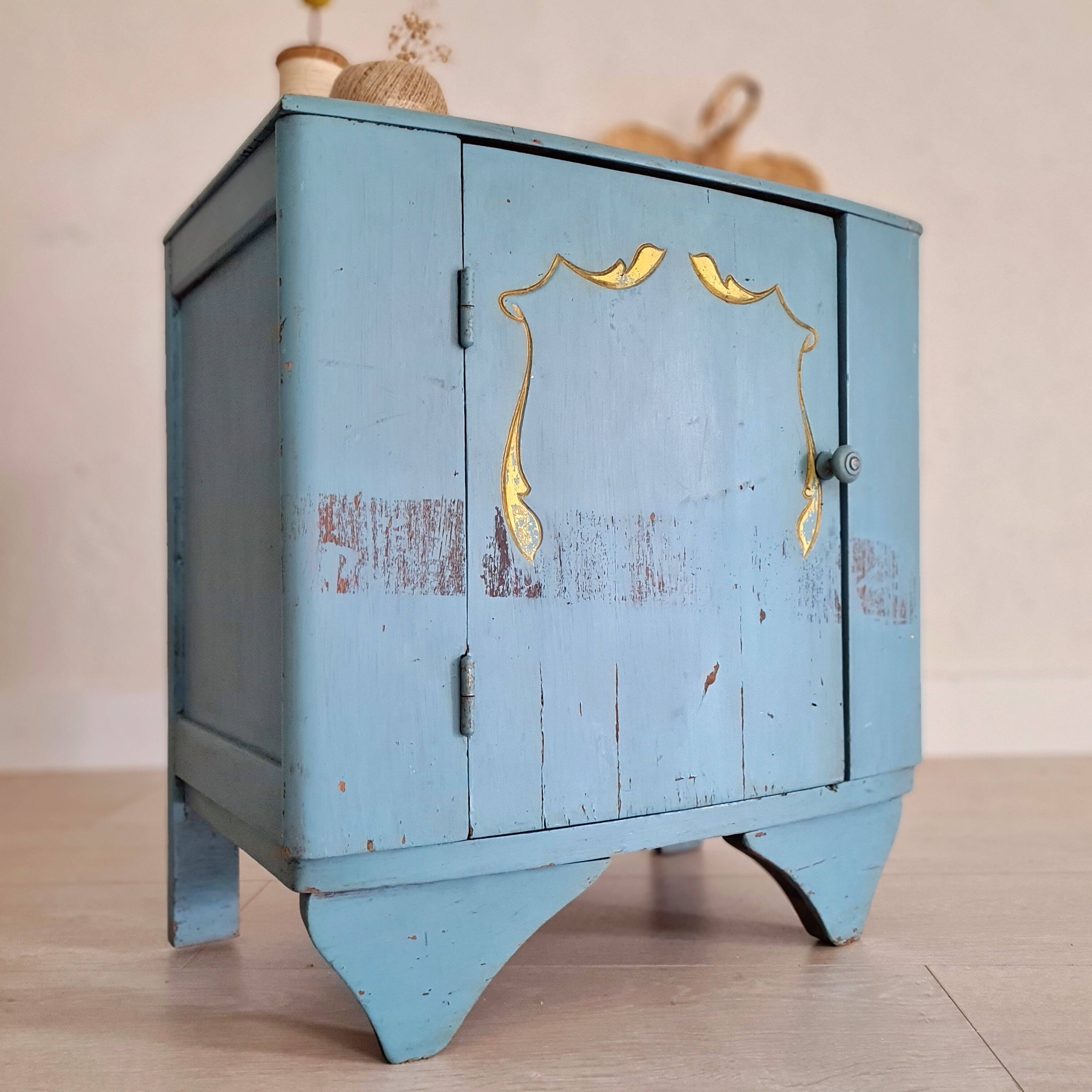 Old blue wood bedside table