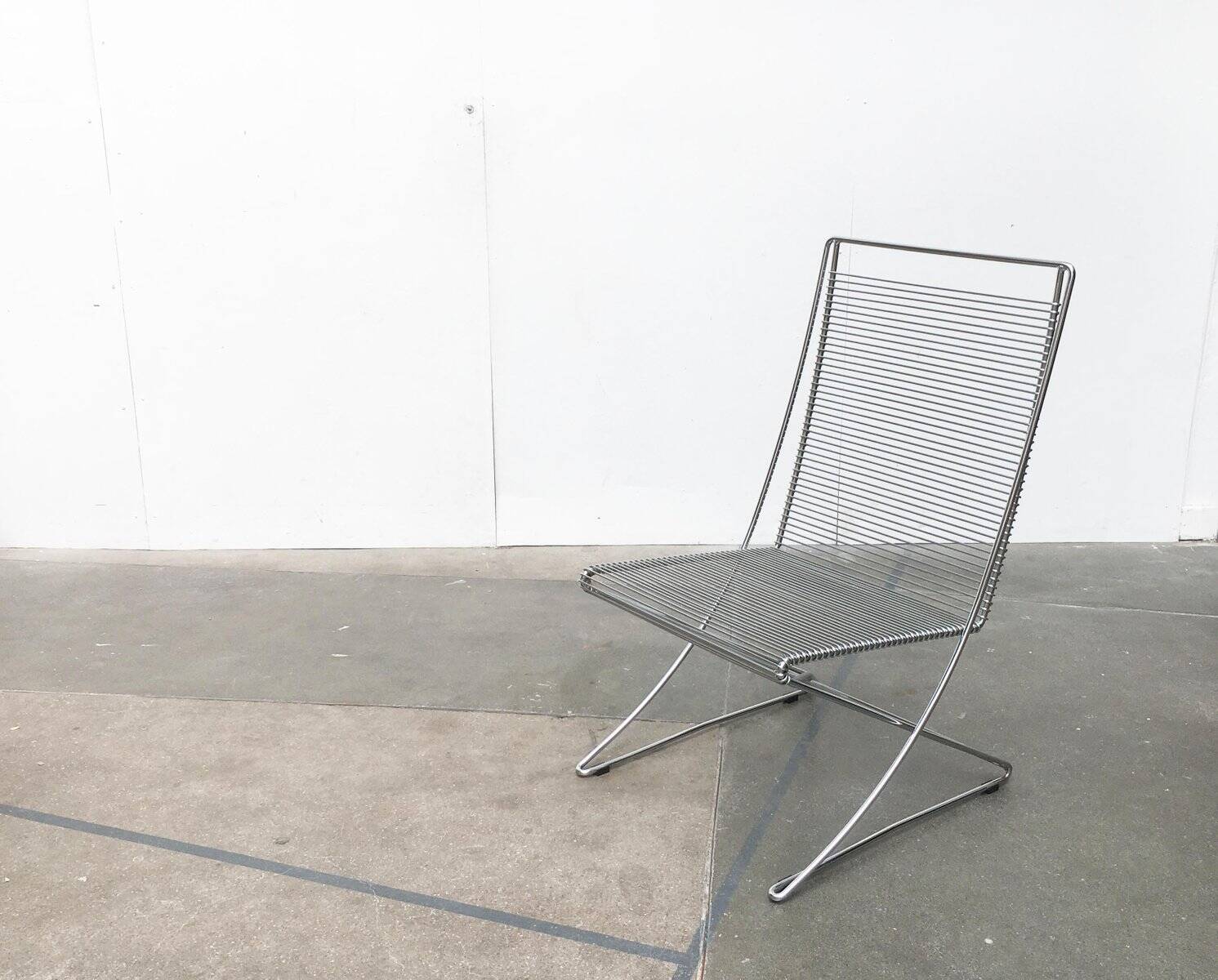 Vintage German Kreuzschwinger lounge chair by Till Behrens for Meyer Stahlmöbel, 1980s.