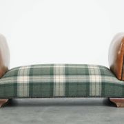 Antique daybed reupholstered with sheepskin and Scottish tartan wool