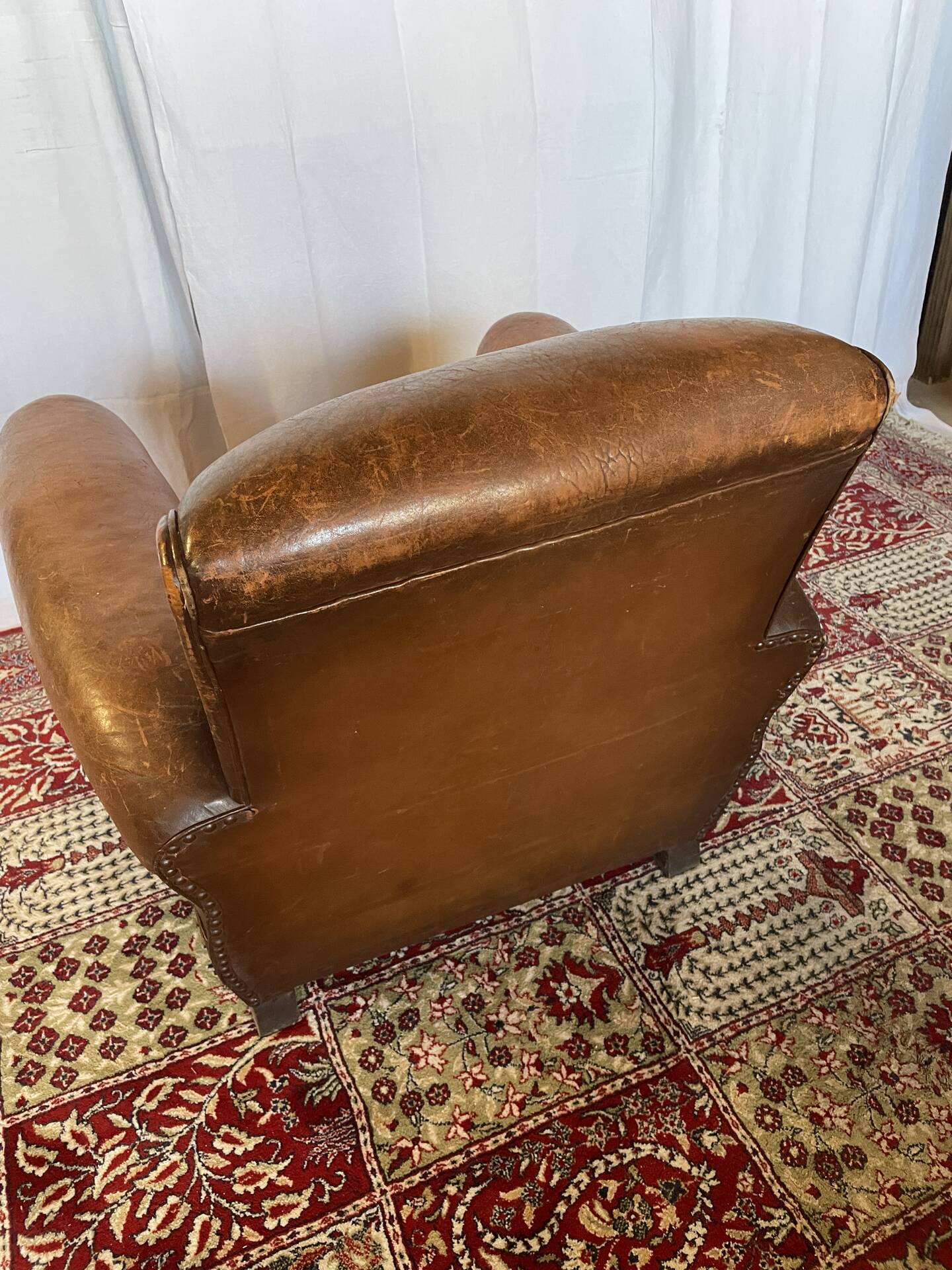 Vintage club armchair in cowhide leather