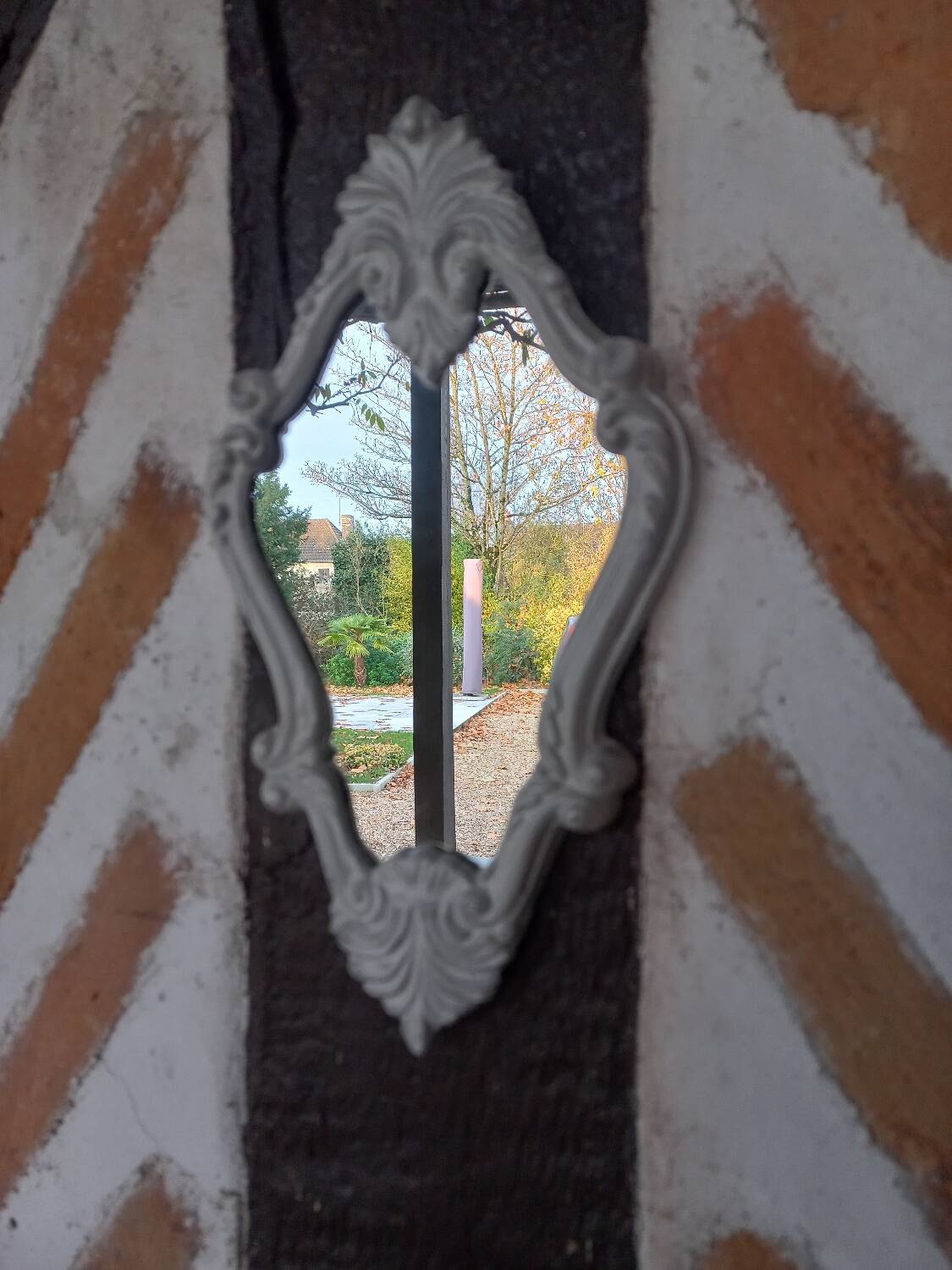 Small patinated baroque mirror