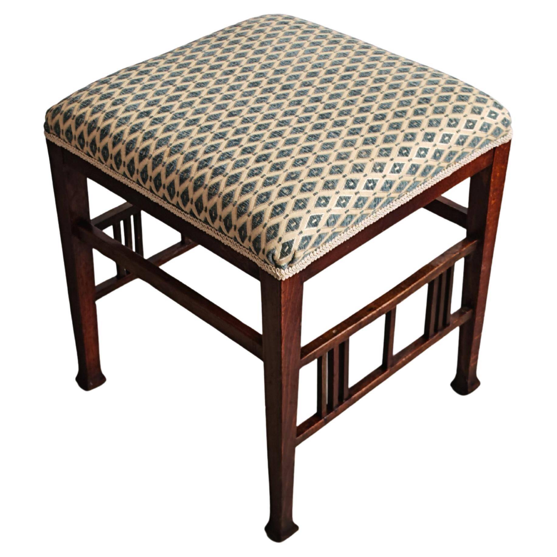 Jugendstil stool in beech and mahogany attributed to Otto Wagner, 1910s.