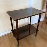 Vintage side table in varnished wood, with casters and gold threads