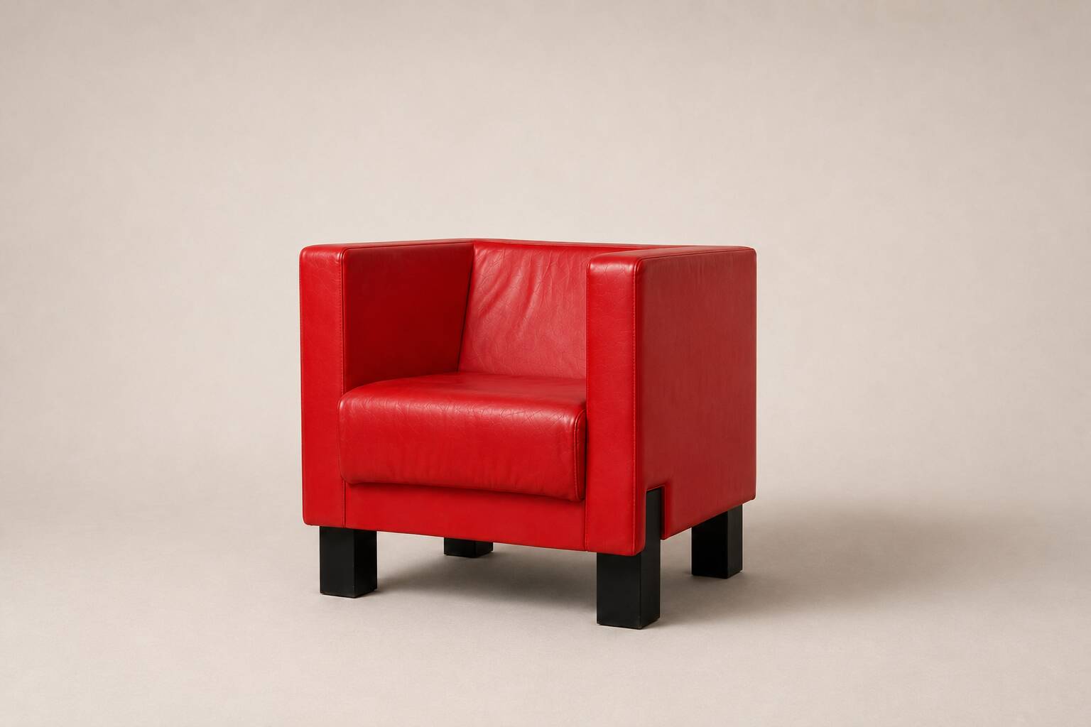 Uchida x Poltrona Frau — Pair of "Moji" armchairs in red leather