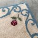 Tapis en laine blanc et bleu fleuri