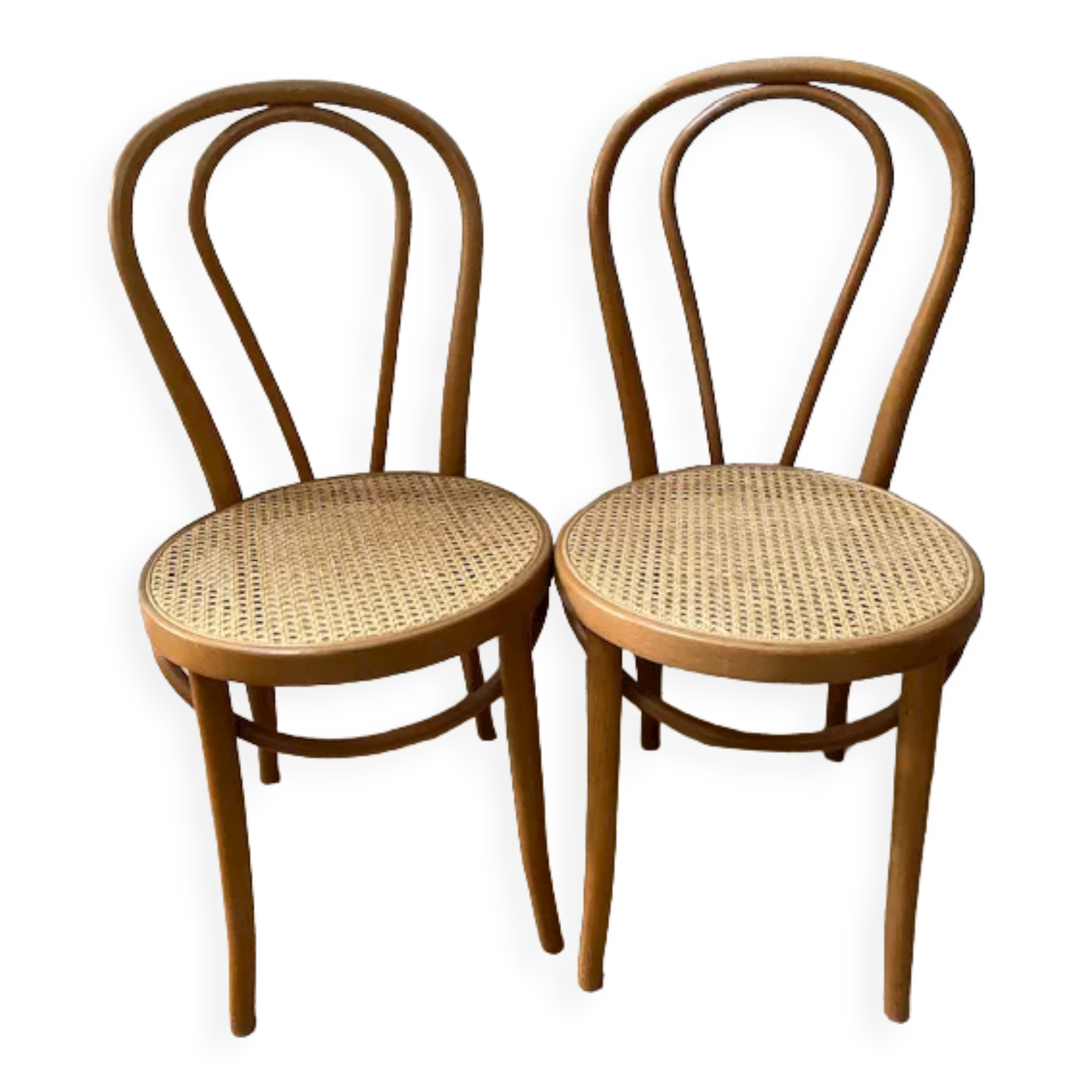 Pair of tanned bistro chairs