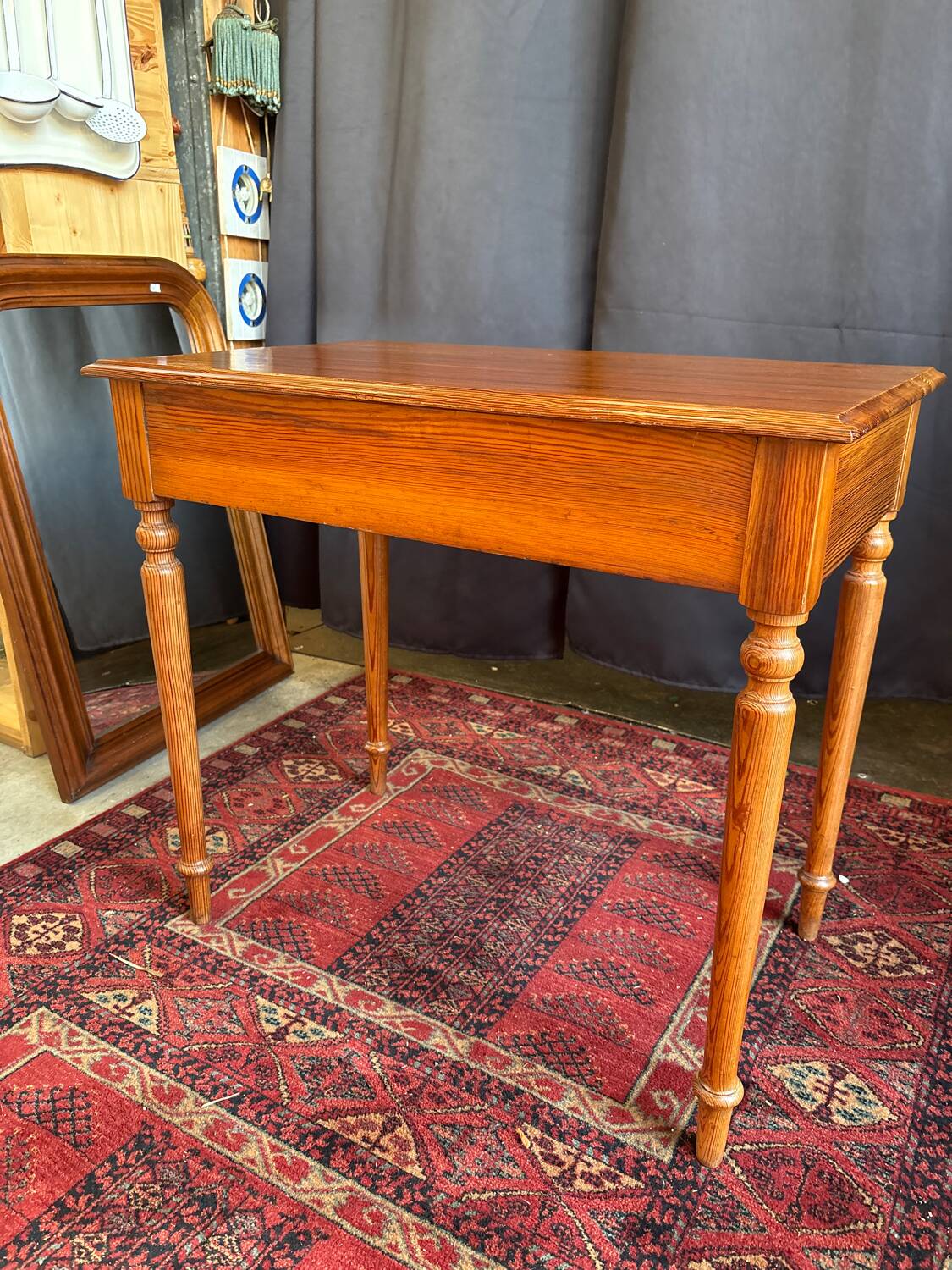 Small solid wood desk with a drawer.