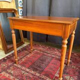 Small solid wood desk with a drawer.