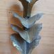Wall lamp design in gilded metal, leaf décor