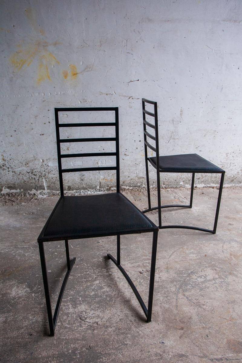 Set of 4 Black Steel Dining Chairs with Black Faux-Leather Seats — Minimalist Geometric Design