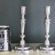 Pair of Christofle silver metal candle holders.
