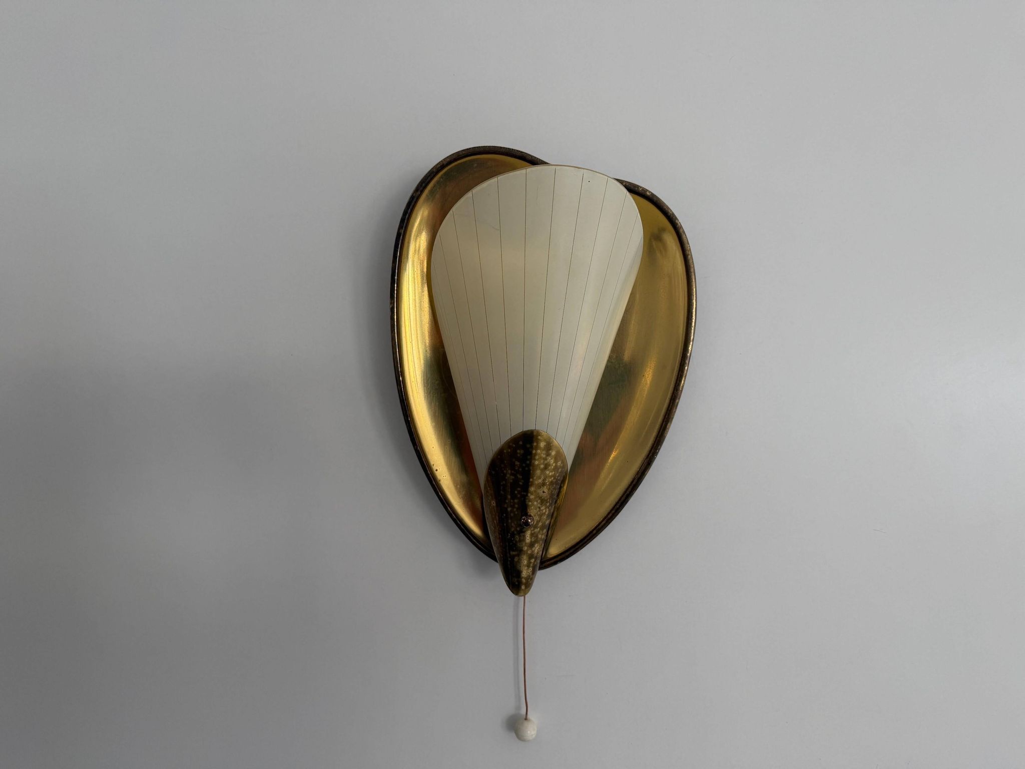 Pair of brass and glass wall lights from the mid-century, 1950s, Germany.