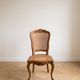 Louis XV table and 4 chairs in wood and marquetry.