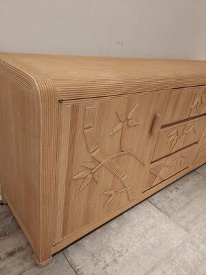 Vintage wicker sideboard with flowers