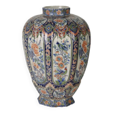 Ancient vase fully decorated with ceramic plants, 20th century.