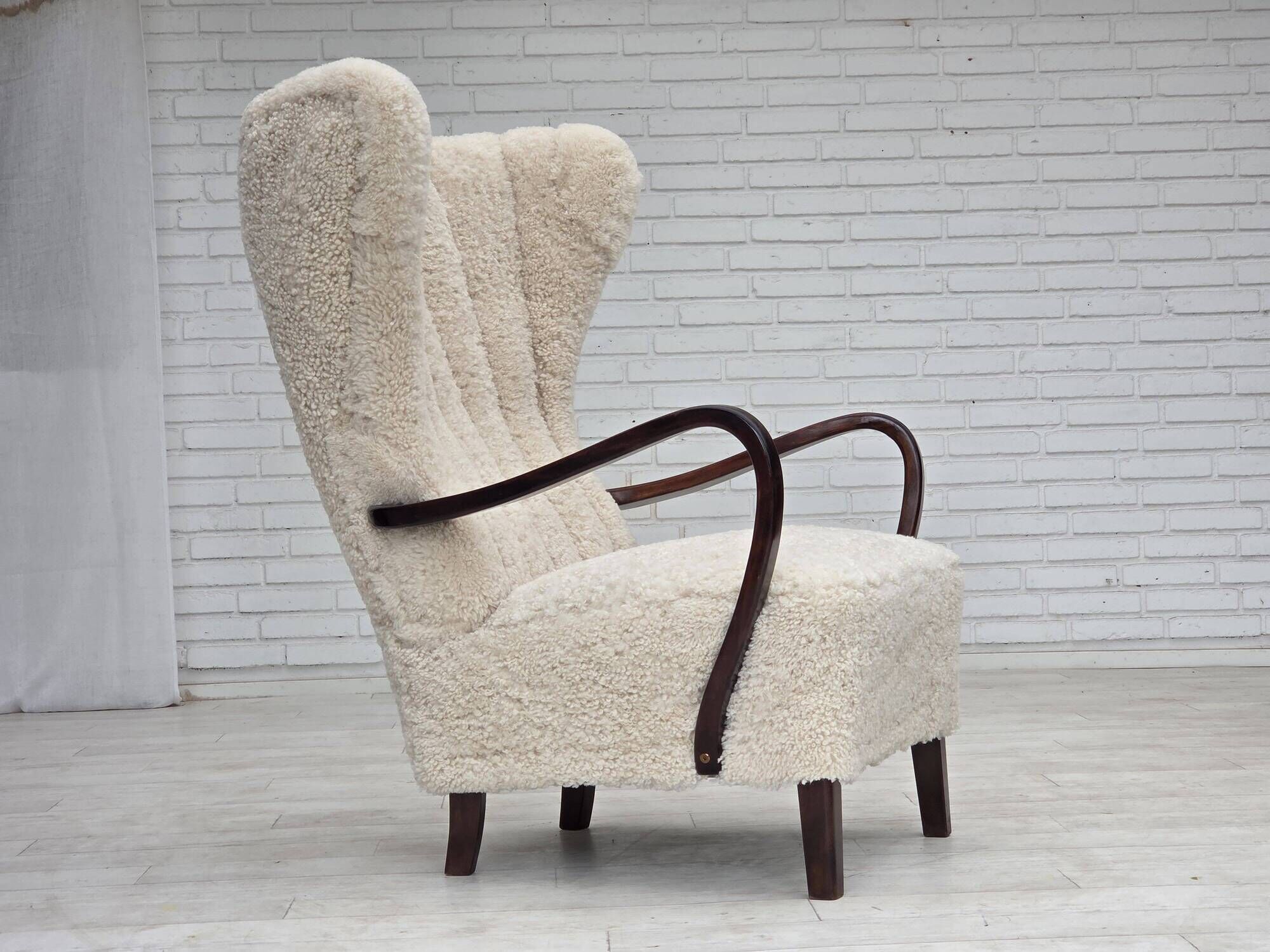 1960s, Danish high-back armchair, genuine sheepskin, reupholstered.
