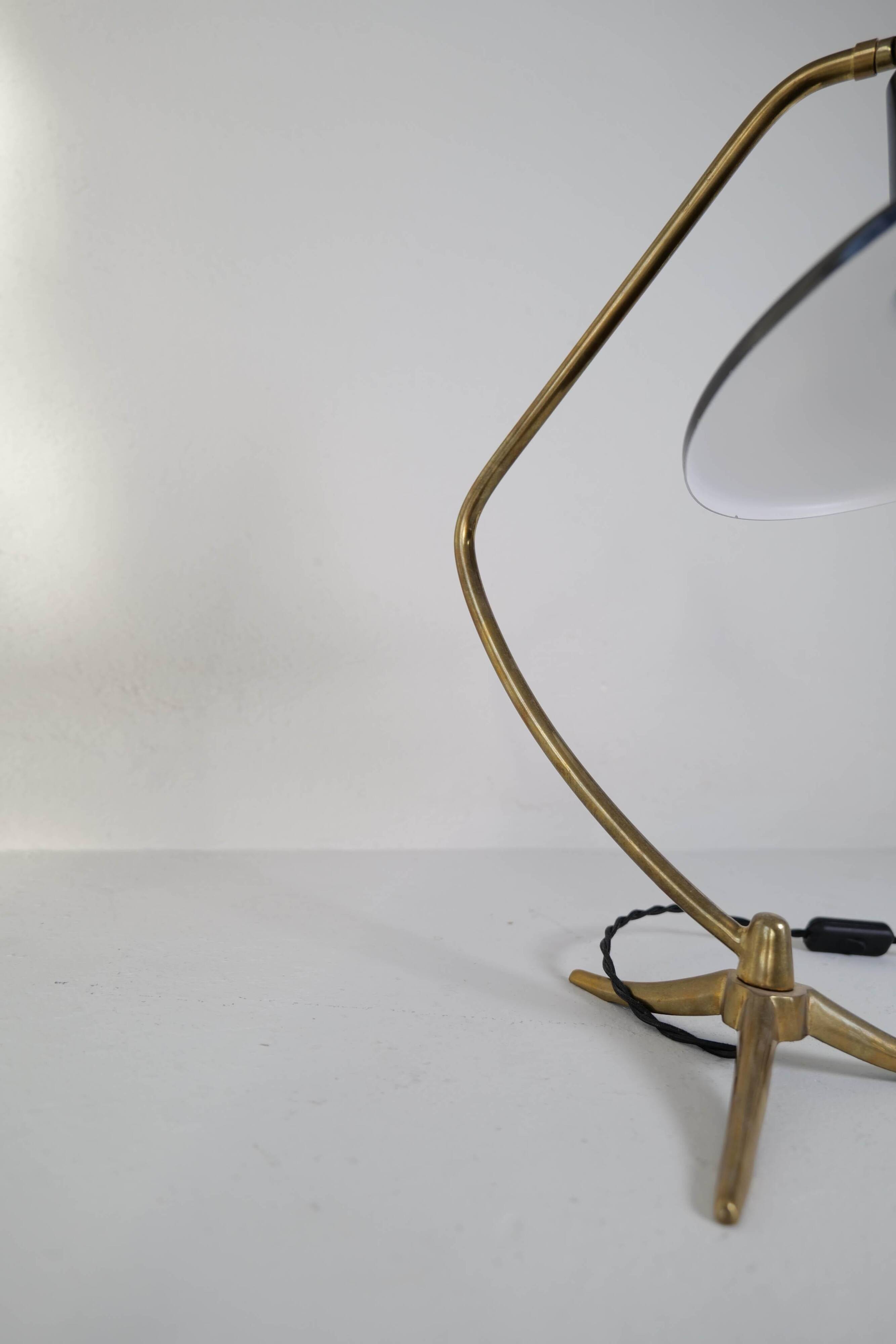 Brass table lamp on a tripod in modern Swedish style, Sweden, 1950.