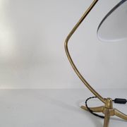 Brass table lamp on a tripod in modern Swedish style, Sweden, 1950.