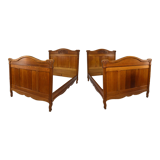 Art Nouveau twin beds in carved solid oak, France, circa 1910