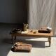 Small stool, footrest in blond teak, organic monoxyle with cut corners.