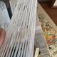 Pair of antique wall sconces brass tulip white striped glass