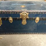 Large blue travel trunk