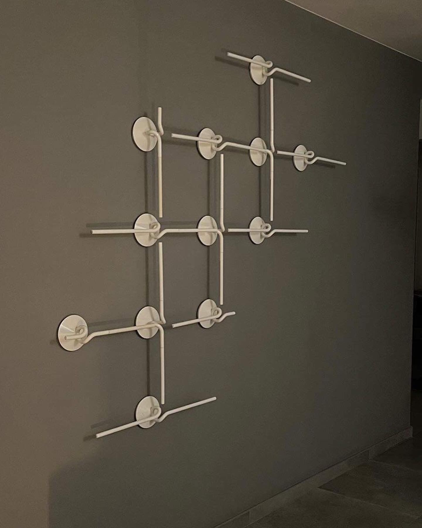 FLOS Light Spring wall lamps composition design