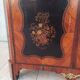 Louis XVI glass-fronted library in rosewood and amaranth veneer.