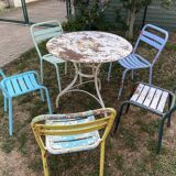 4 mismatched chairs Tolix brasserie bistro terrace French bistro 60s