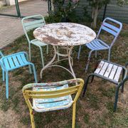 4 mismatched chairs Tolix brasserie bistro terrace French bistro 60s