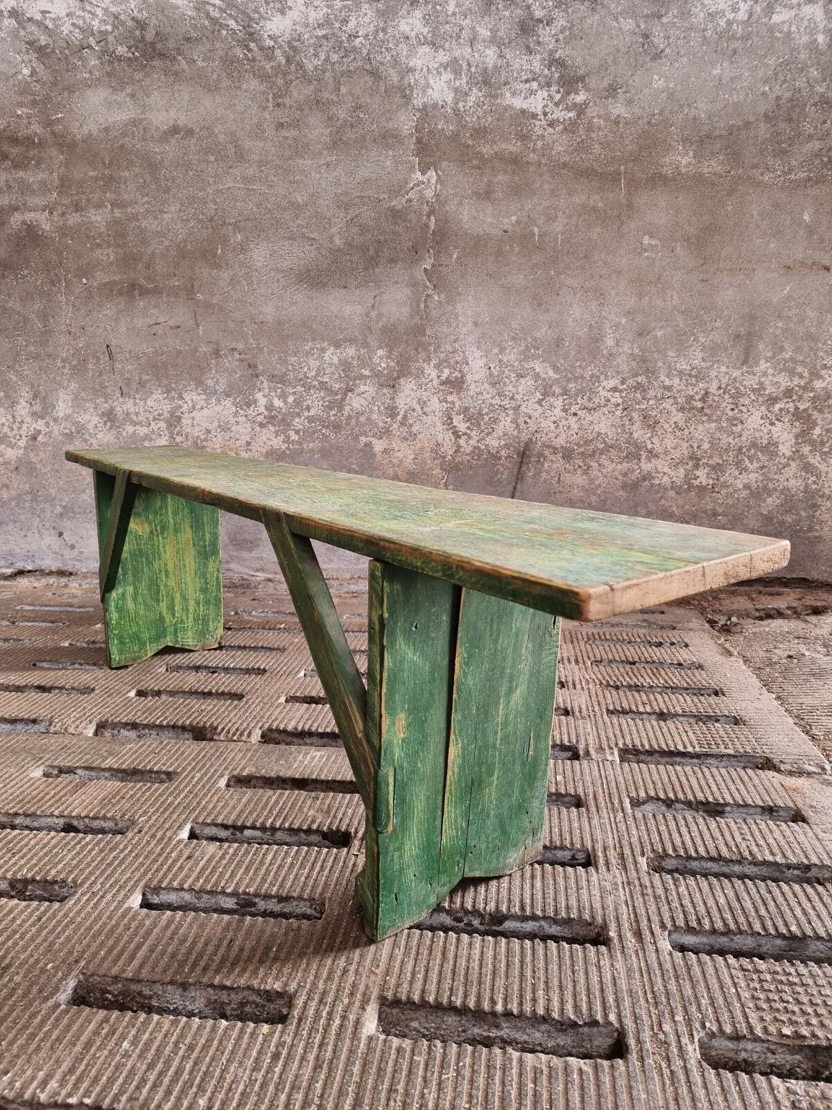 Old wooden bench side table grass green