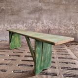 Old wooden bench side table grass green