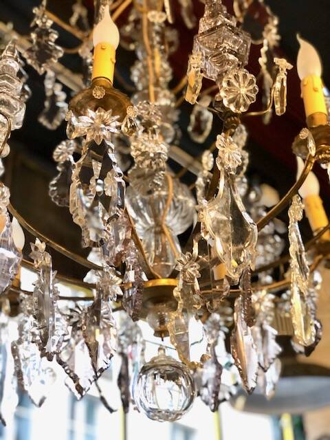 Large chandelier with tassels and old daggers
