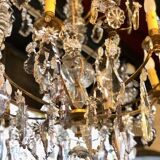Large chandelier with tassels and old daggers